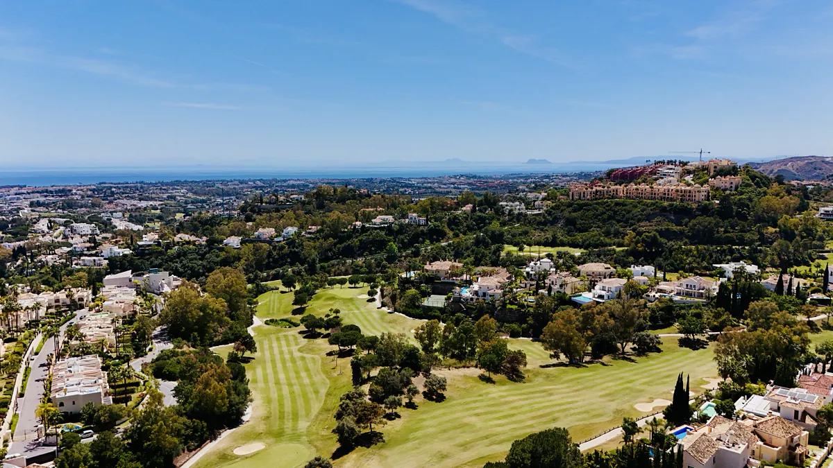 The golf valley and the sea below the building
