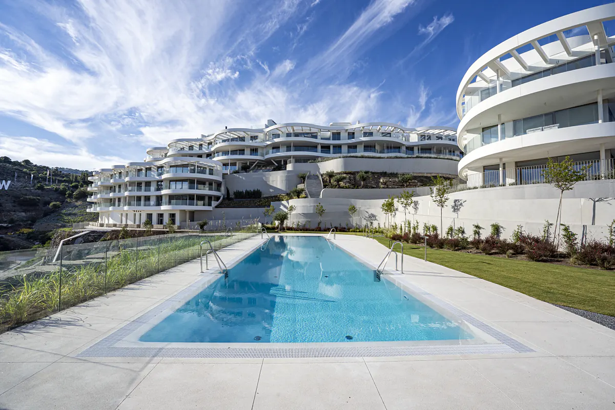 The long outdoor pool and gardens of The View Marbella