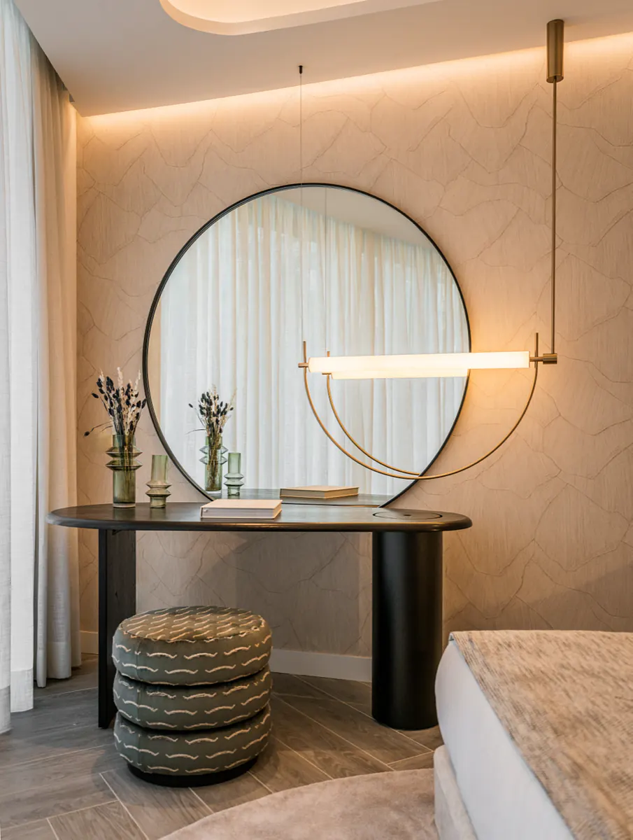 Dressing table with a round mirror